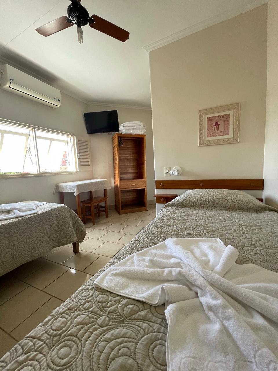 Quarto duplo com TV